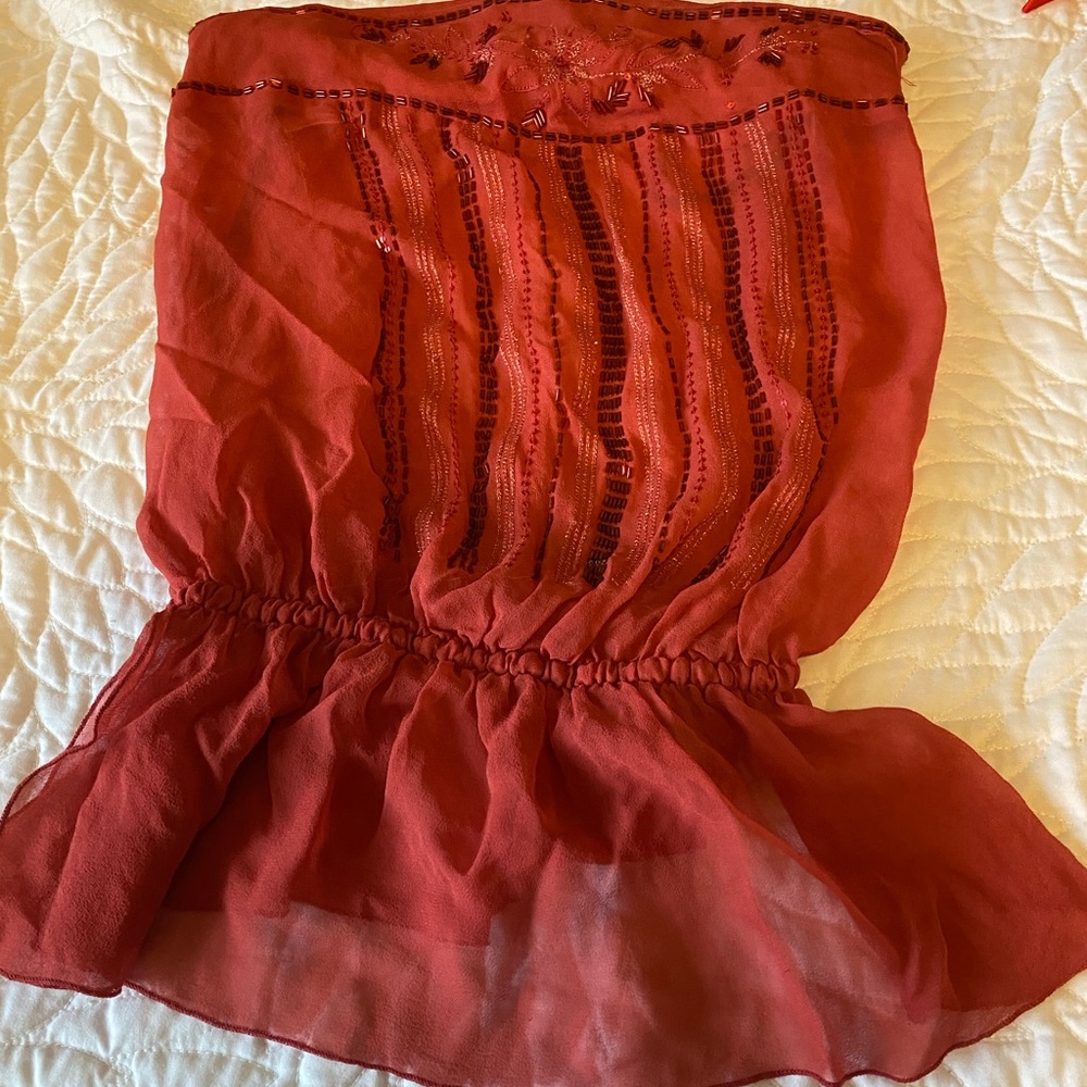 Bebe embroidered strapless top
